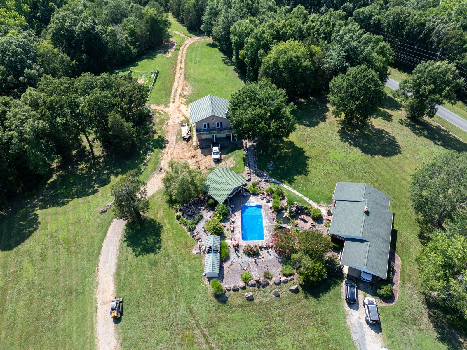 3400 Biggers Road — aerial over the residence, pool and guest house