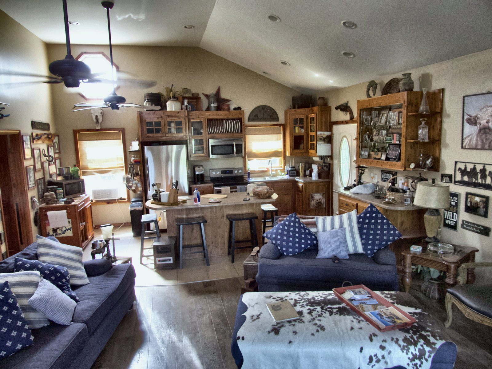 3400 residence — kitchen and breakfast bar open to living